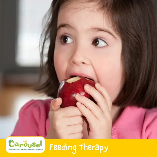 cot-ser3 feeding OT therapy - young girl eating an apple